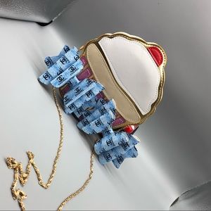 Hermosa bolsa con diseño de Cupcake y con unos muñequitos hermosos